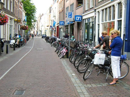 Bikes and shoppers outside a supermarket in the Netherlands